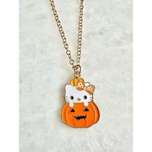 Hello Kitty white and orange Halloween jack-o’-lantern and pendant necklace ￼
